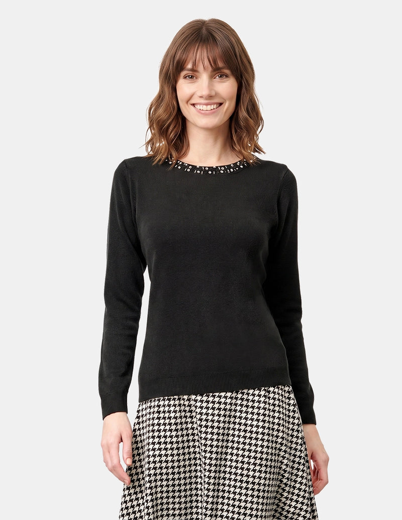 Blusa cuello redondo con bordado negro