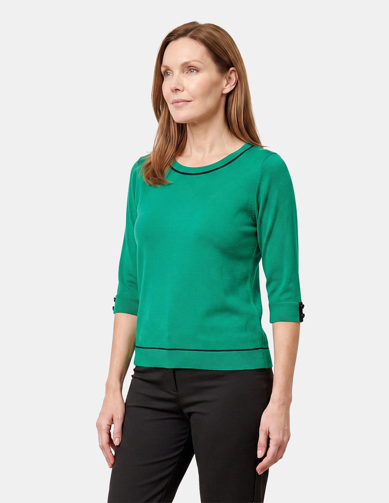 Blusa con detalle detalles tonos negros
