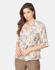 Blusa abierta con dealle de olán en el cuello Vitos