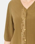 Blusa abierta con detalle bordado Vitos