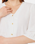 Blusa blanca escote V bordado Vitos