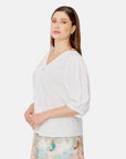 Blusa blanca escote V bordado Vitos