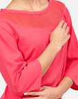 Blusa manga corrida cuello redondo con bordado Candela