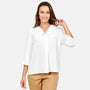 Blusa cuello V con broche Bernal