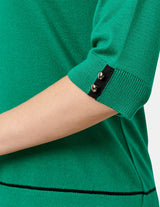 Blusa con detalle detalles tonos negros