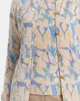 Cardigan estampado cuello redondo complemento