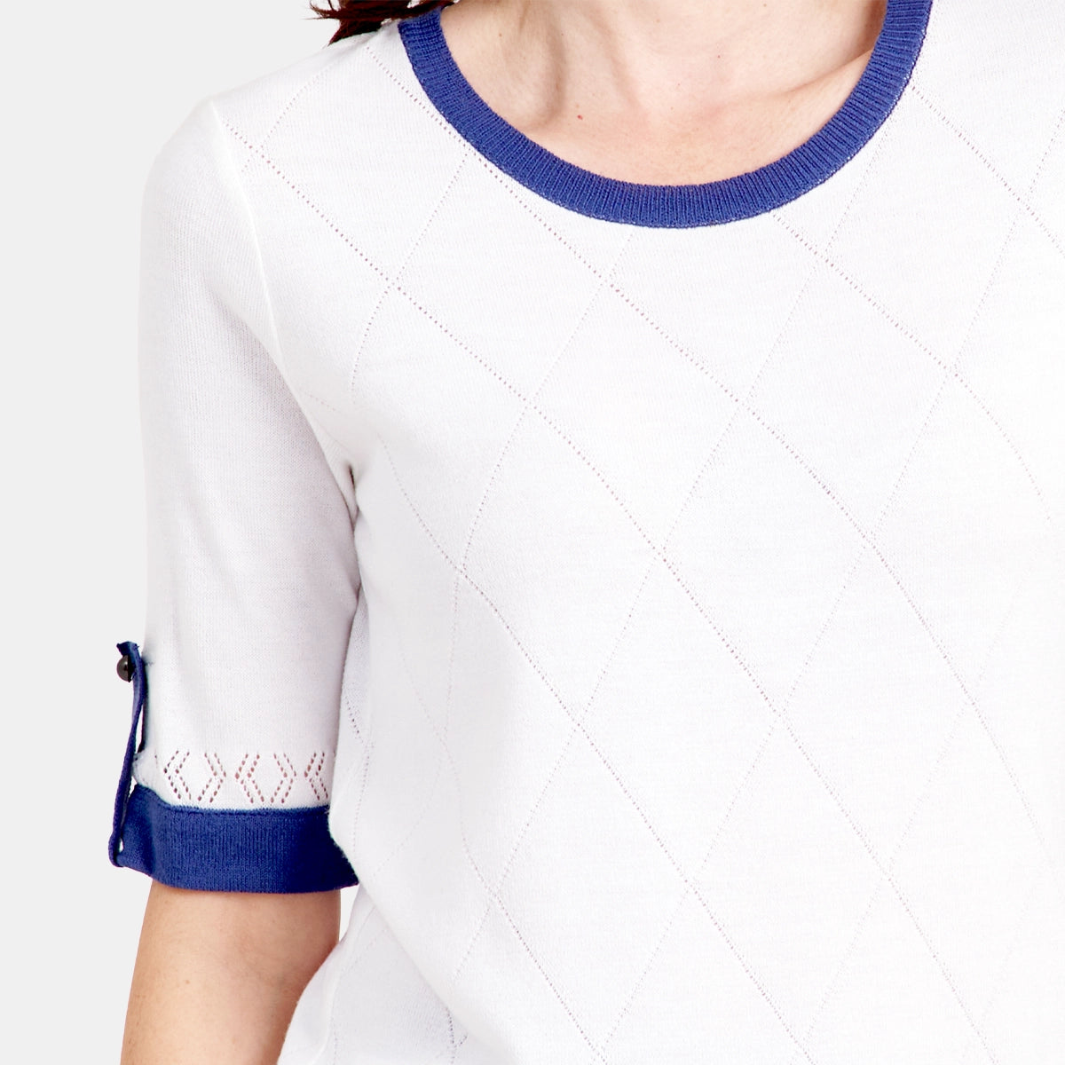 Blusa cuello redondo con detalles Reina