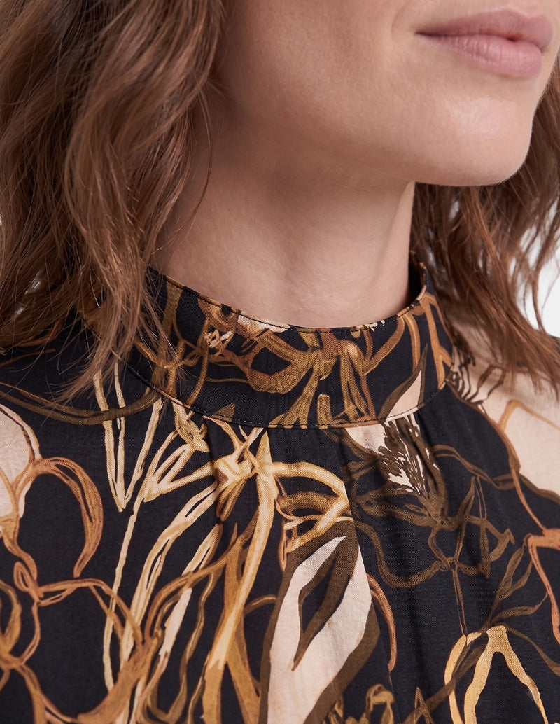 Blusa cuello alto Collin